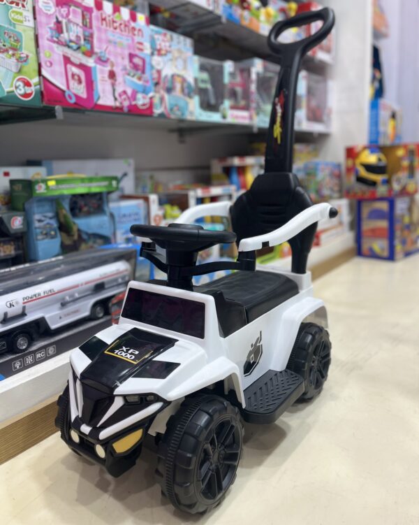 Auto poussoir musical blanc